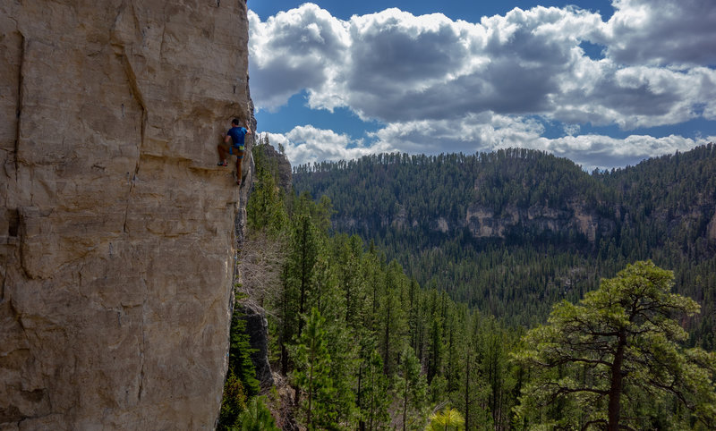 Eric moving off the arete, headed for the chains!