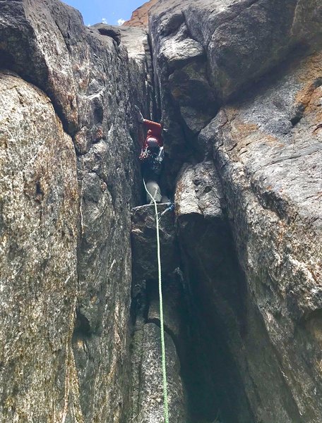 Tyler taking a last rest before heading up the squeeze chimney and offwidth.
<br>
<br>
Photo by Mike Schneiter.