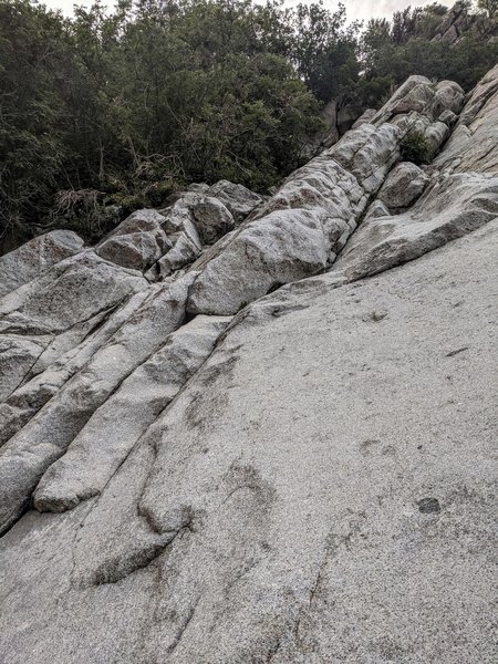 A side view of the cracks. Anchors out of frame to the right at the top, angle approx 50-60deg