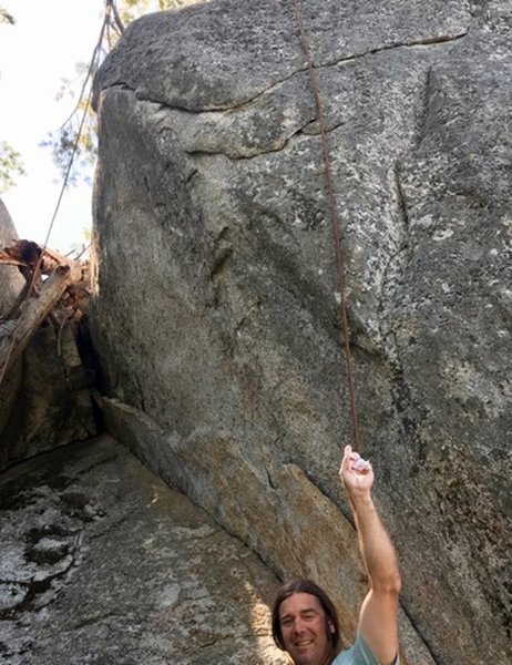 Climb starts at the rope on the right and angles to finish where the rope on the left hangs