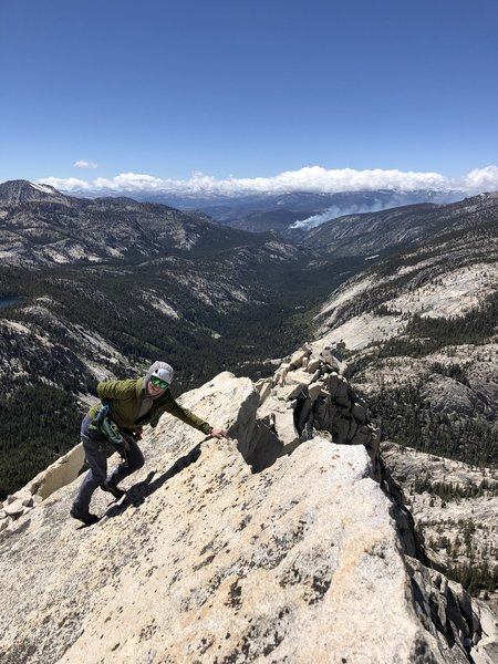 Audrey having fun at the summit! pumice fire in the distance.