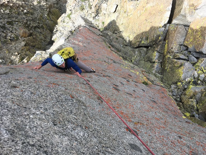 Richard sending a cool knobby face near the end of the route. Clever rope work (or running it out) will let your follower climb this.