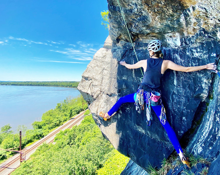 Amy steps out toward the arete of Josh's Hump, a blind, committing move that is considering the "High Exposure" move of Chickies Rock. Ben Annibali photo