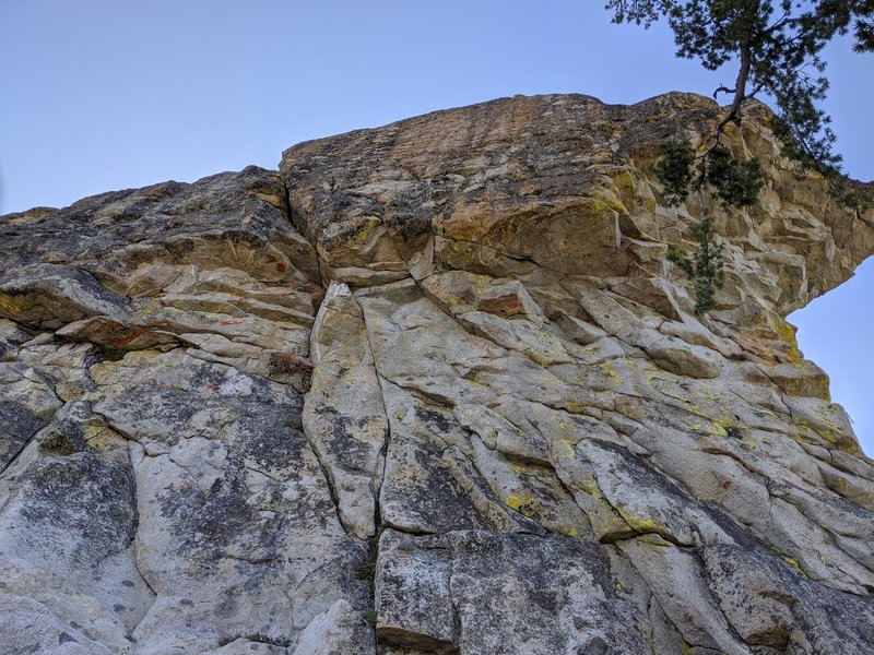 The left side of the buttress, hosting a protectable crack and an 11b bolted line up the face