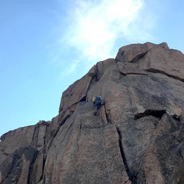 The final real pitch. Cracks and face lead up to the obvious break near the top, which could be climbed directly at 5.9/5.10. We hand-traversed around to the right to exit, which was fun.
<br>
<br>
Photo by Kelly Cordes.