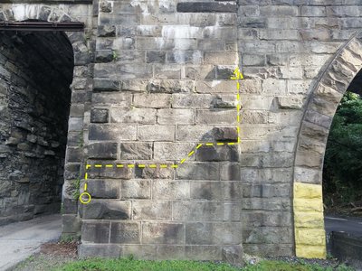 West facing, in between the foot path and the road