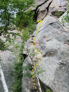 Erin just past the crux. There is a lieback section after some easy climbing that is intimidating and seems like it would be the crux. However, once you get through that you get to the real crux where you must place pro, so be ready!