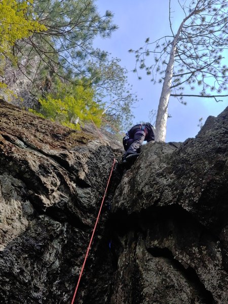 Start up the crack to a ledge, continue onwards!