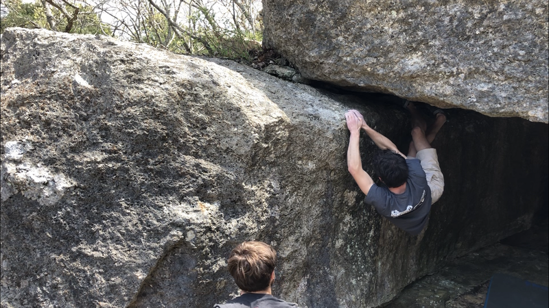 Shows starting hand hold of the cave stand start, move left and up