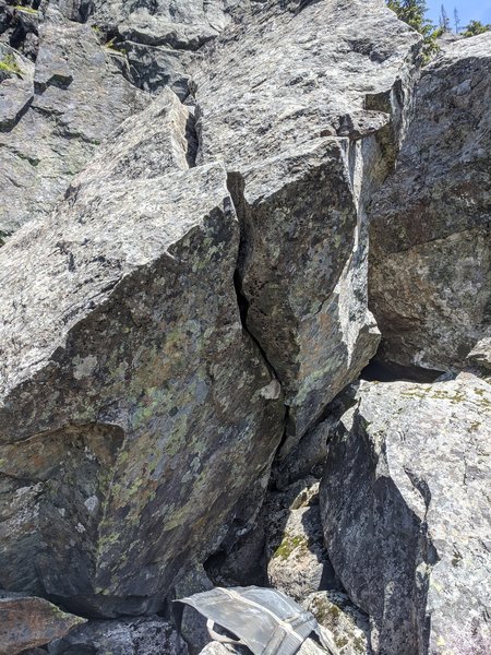 Two nice hand jams can be found super low in the crack. I didn't have a pad (just my crazy creek chair) but I would recommend at least one to protect the rock at the base.
