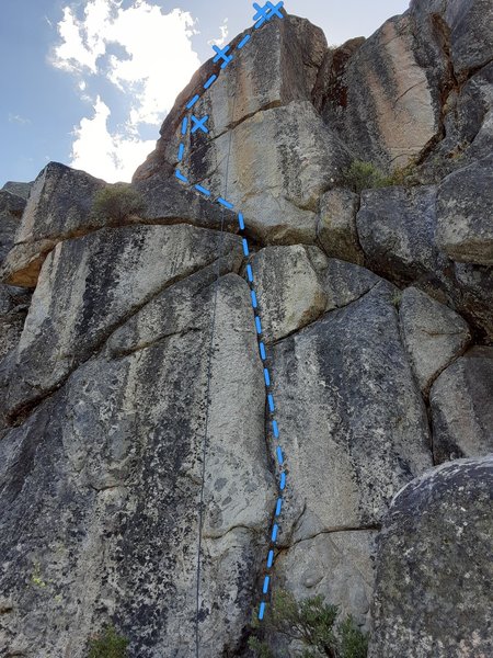 Route follows the obvious crack down low, then steps slightly left up high.