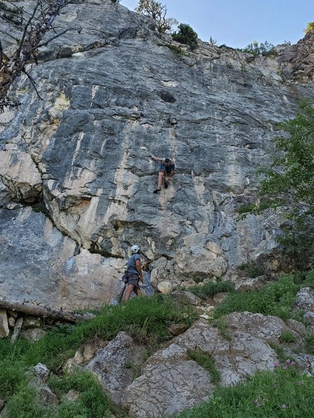 Sam starting up the route with the huge chert features visible about halfway up the route. Great route!