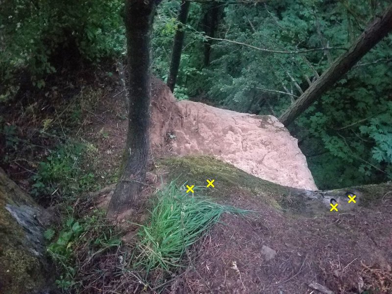 Take the approach trail for the Smears for Fears anchors. Before you reach the Crack Warrior chain anchors, look left. You'll spot 2 sets of anchors for You'll Dance to Anything (right) & Sheer Madness (left).
