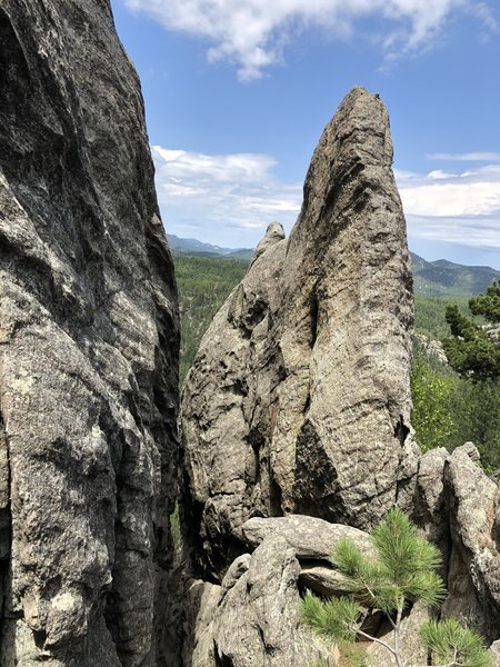 Looking at the beginning of the corridor that is the Hall of Truth. Climbs on the right and left side of corridor. Great shaded and breezy climbs steep sculpted boulder like climbing.