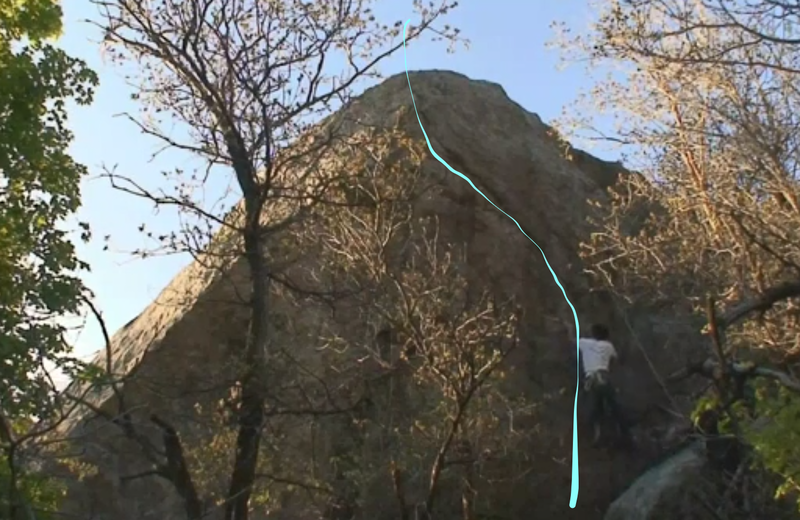 Screenshot of toprope ascent with permission from Johnny Landry, who shot the footage circa 2012. Blue line shows path up the face, to the crack, and out.