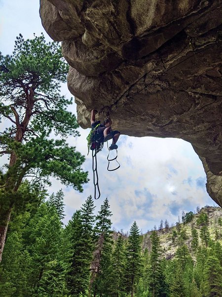 Cole Pazar aiding through Headline (C1). The right crack of the "Old Aid Roof" with two bolts is also known as "Deadline" after it was free-climbed by Rob or Jerry. The left crack is now known as "Headline" as the free climb of it will make headlines.