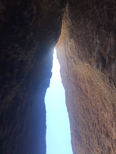 Final chimney. Went left shoulder in and was pretty relieved to get to the slung boulder about 15-20 above last gear which was a 0.75 cam and a marginal, finger-sized c3 above it a few feet.