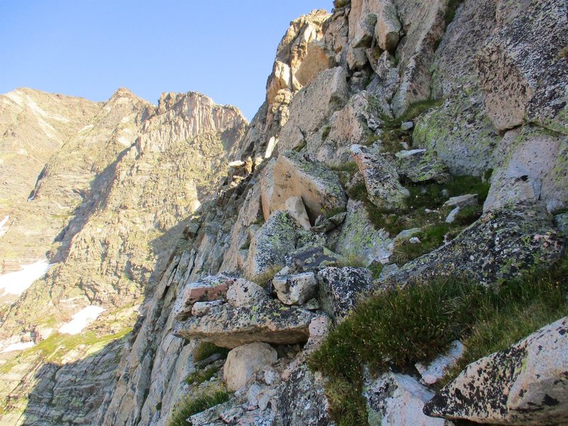 Narrow ledges around the left/south sides of Aces 1 and 2.
