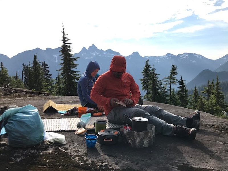 Camp on the rock slabs where the trail breaks into the alpine is excellent.