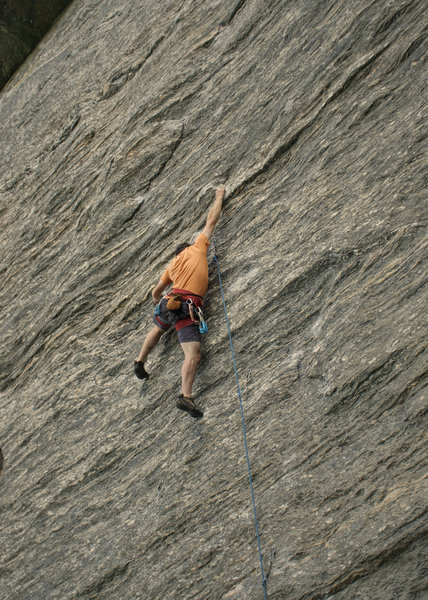 climber working the route