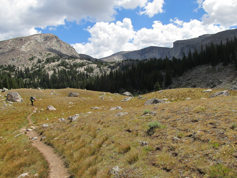 Spectator Buttress is above the hiker, on the left as you enter the Lost Twin Lakes cirque.