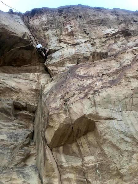 Start trying to make the most of Choss, and then enjoy a thrill in the middle as you pull the crux over the small roof with double hand jams and then soar through a clean crack!