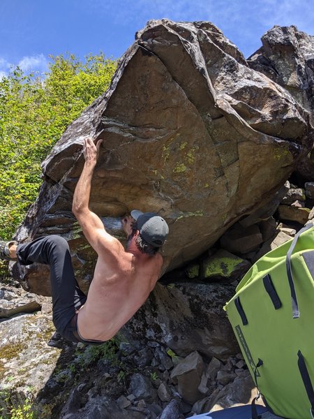 Solid small roof boulder! Good holds, bouncy moves! Wish it was longer though. Could have a fun shorter variations starting from the large roof flake (V3/4?). Bummer about the name though.
