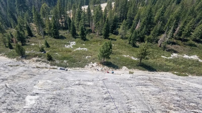Looking down from near the top of the route. Climbers at Pitch 1 anchor.