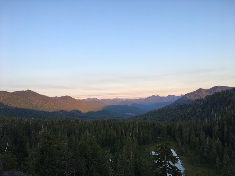 View from the top of the main wall at Coal Mountain. Dakobed (Glacier Peak) in the distance.