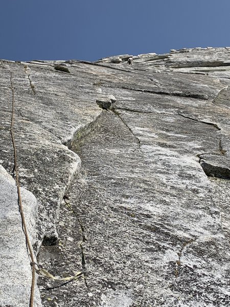 Paul at P3 belay (well right of rope line in pic)