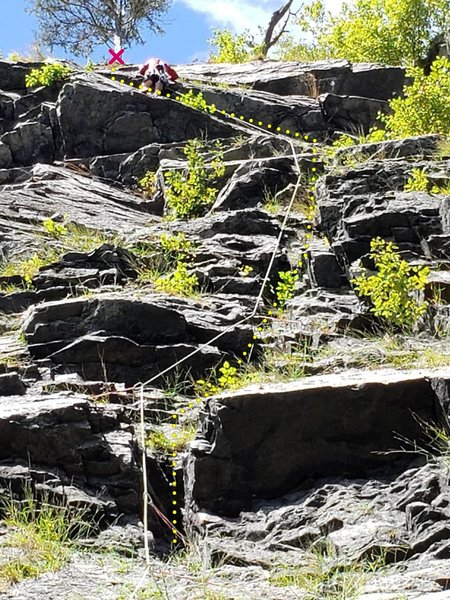 Alex at the end of the traverse on Triumverate. Bolted belay is just above the tree about 10 ft above and left of the climber pictured.