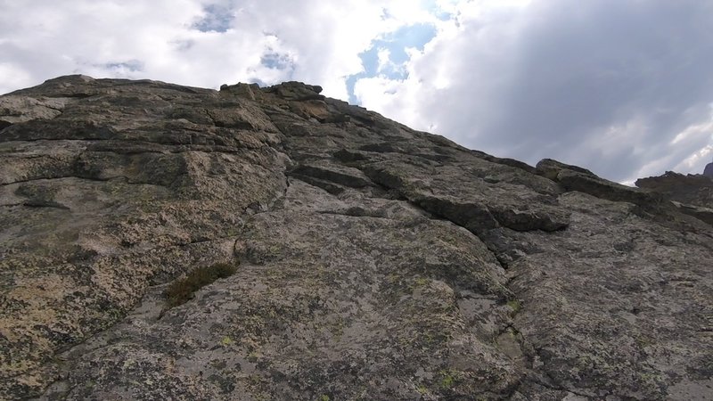 Isolation Peak crux. Mid 5th straight up. After about 100', trend left to pick up 4th Class and on to the summit - eventually.