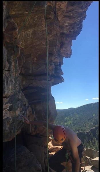D. Houston preparing to send. The rope clipped through 2nd bolt reflects steepness of start.