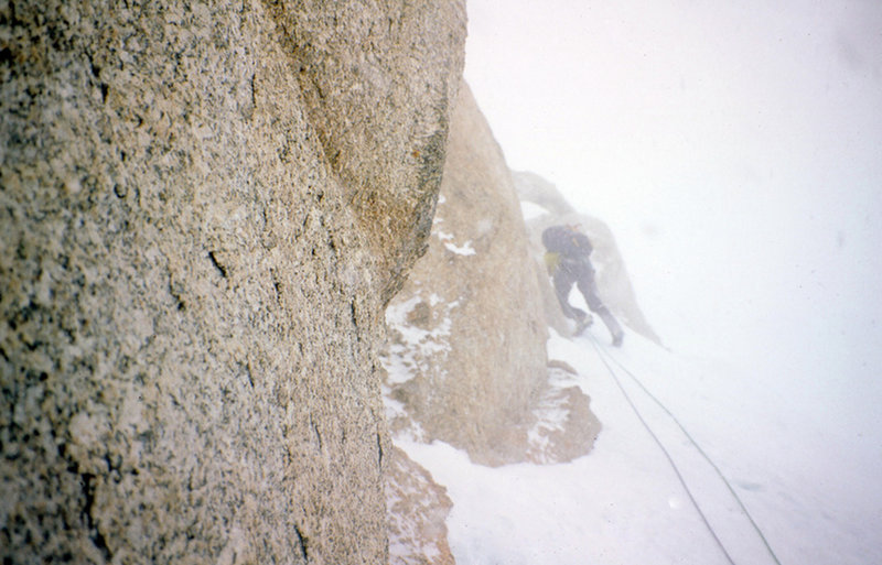 Climbing steepish ice in a storm thru a rock band aprox 15k on west rib