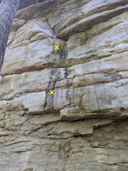 The start to Kistler's Mother 5.11b Trad. Two bolts in the black streak.