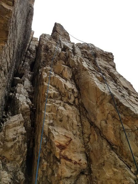High hopes from the bottom, top roped to show the chains location. First bolt is on the bottom right.