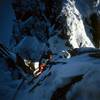Rappelling the south face in winter 1991