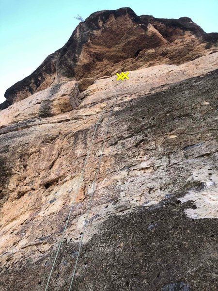 Summer Fugue (5.10a), first route right of the right-facing corner. Finishes below the roof.