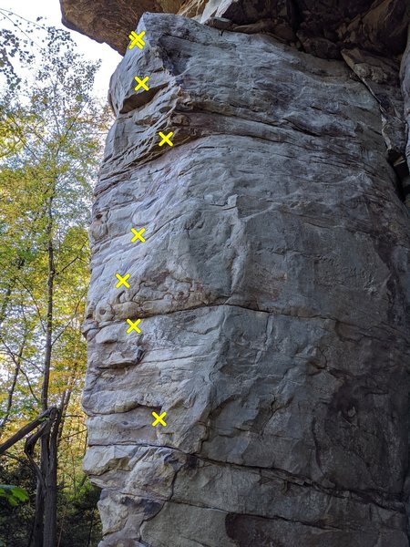 Submarine climbs the thin slab right of the arete.