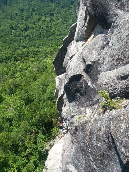 John in the crux zone of pitch 2 CRANKING on quartz chunkery