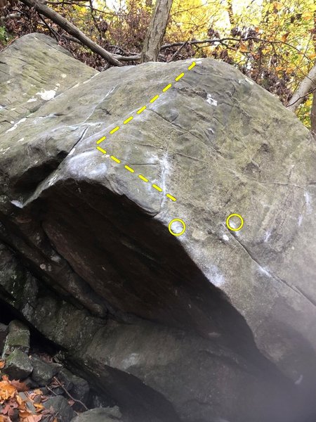 Hands start on small crimp seam (lower right) and sloping lip; move left and up on slopers and seams before coming back right to pull the lip to top.