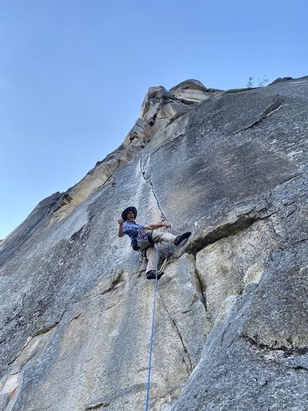Max Matles walking up the crux