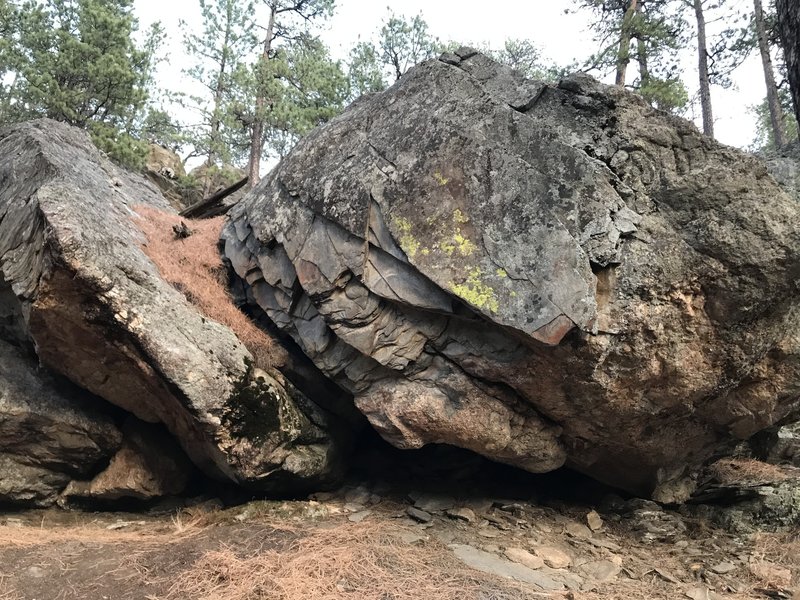 CUP on the left. I'm sure there are other problems on the right boulder. If not, there sure is potential.