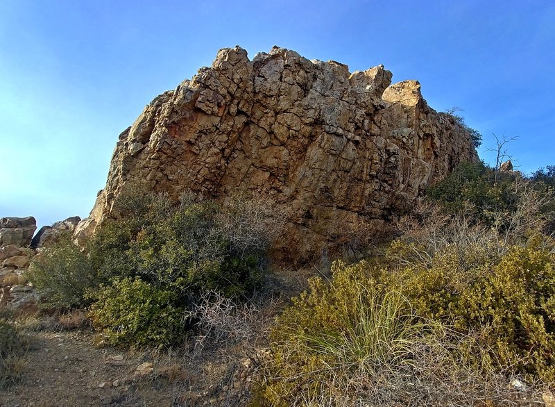 Vertical east face of the smaller formation to the south of the arch formation. Okay landings.
