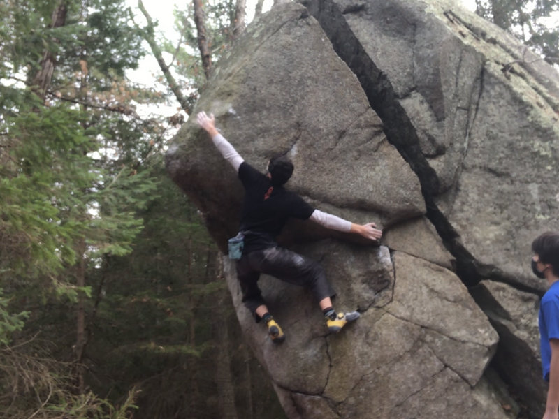 Reaching for the bad sloper at the crux.