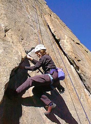 Nancy Hobbs, after only four months of climbing, ready to take on the 11b crack climb. Hard core!