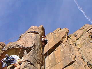 Shaun Miller reaching for that bomber hold on the left side.