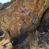 The Eyewitness Boulder. TYL (V10) is red, FI (V3/4) is blue, and ETP (V8) is green. This boulder is visible from the road.