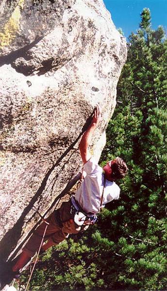Pete Franzen on the crux final move of Dyno Monkey