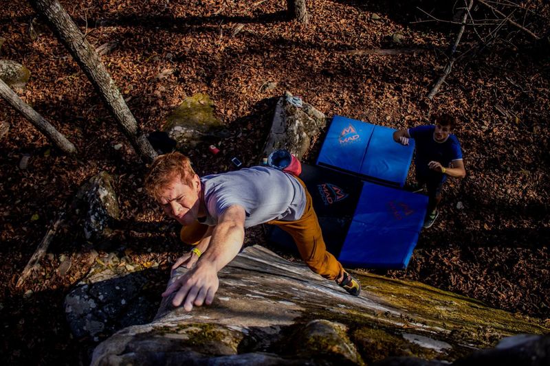 Climbing in WarmUp Boulder, Horseshoe Canyon Ranch